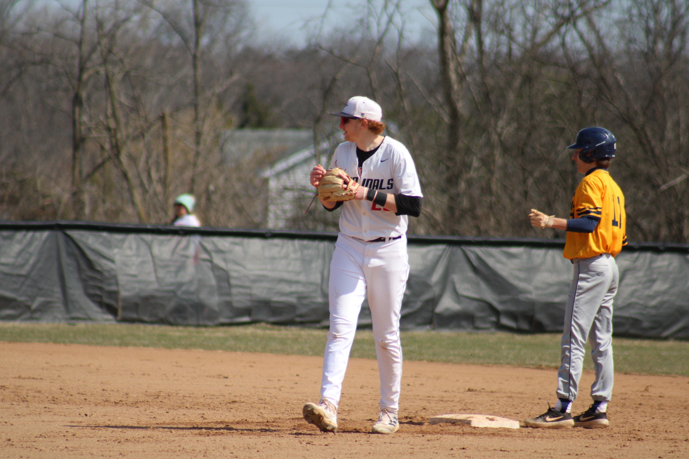 Baseball splits double header with Madonna