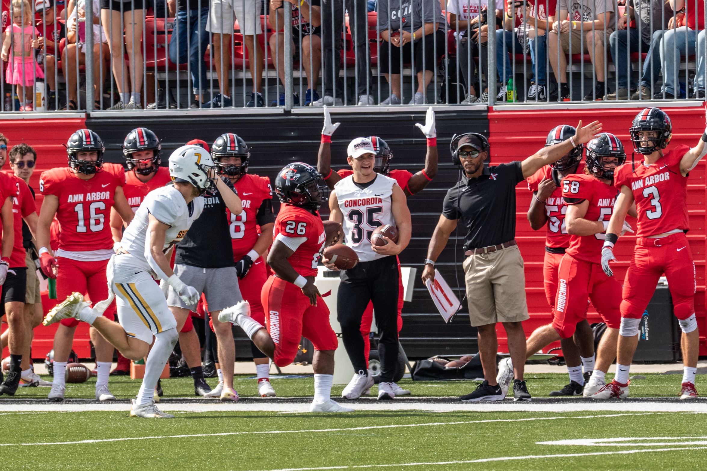 Football outlast Trojans for 28-21 win
