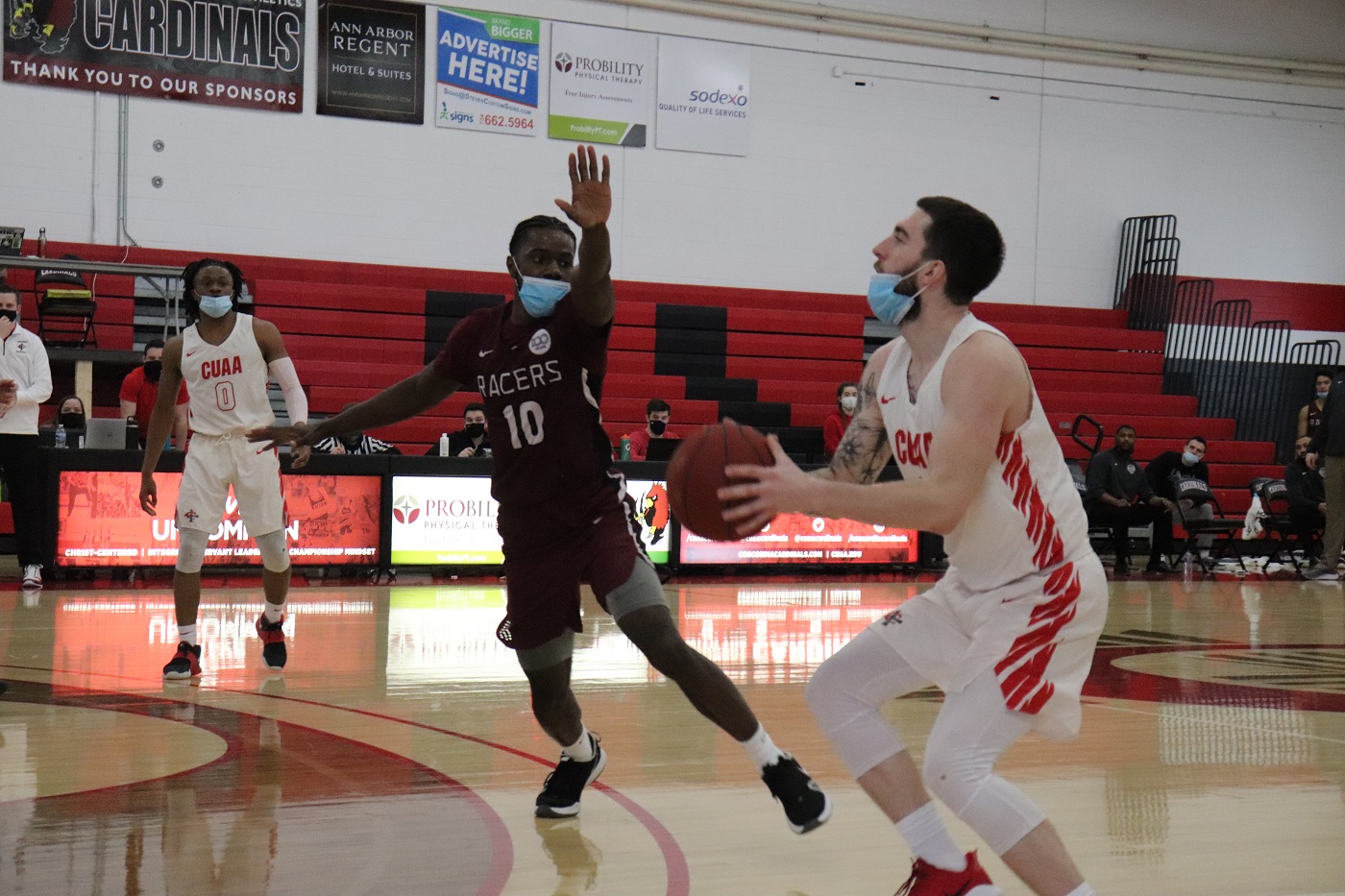 Tom Hronis leads the Cardinals with 24 points including the go-ahead 3 pointer with :08 seconds left.