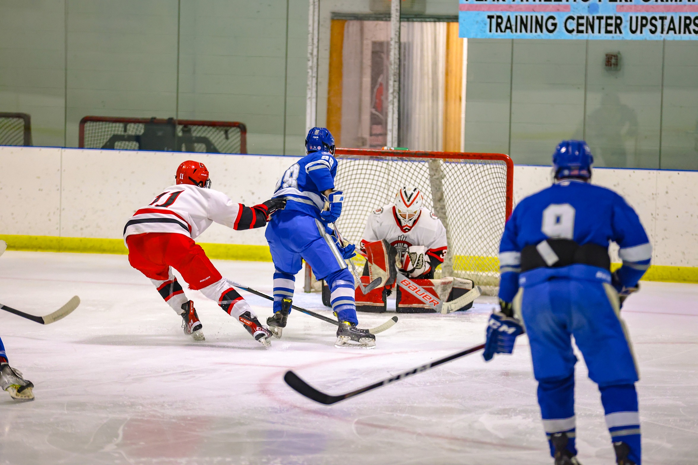 Men's Hockey suffers loss at Aquinas after late Saints surge