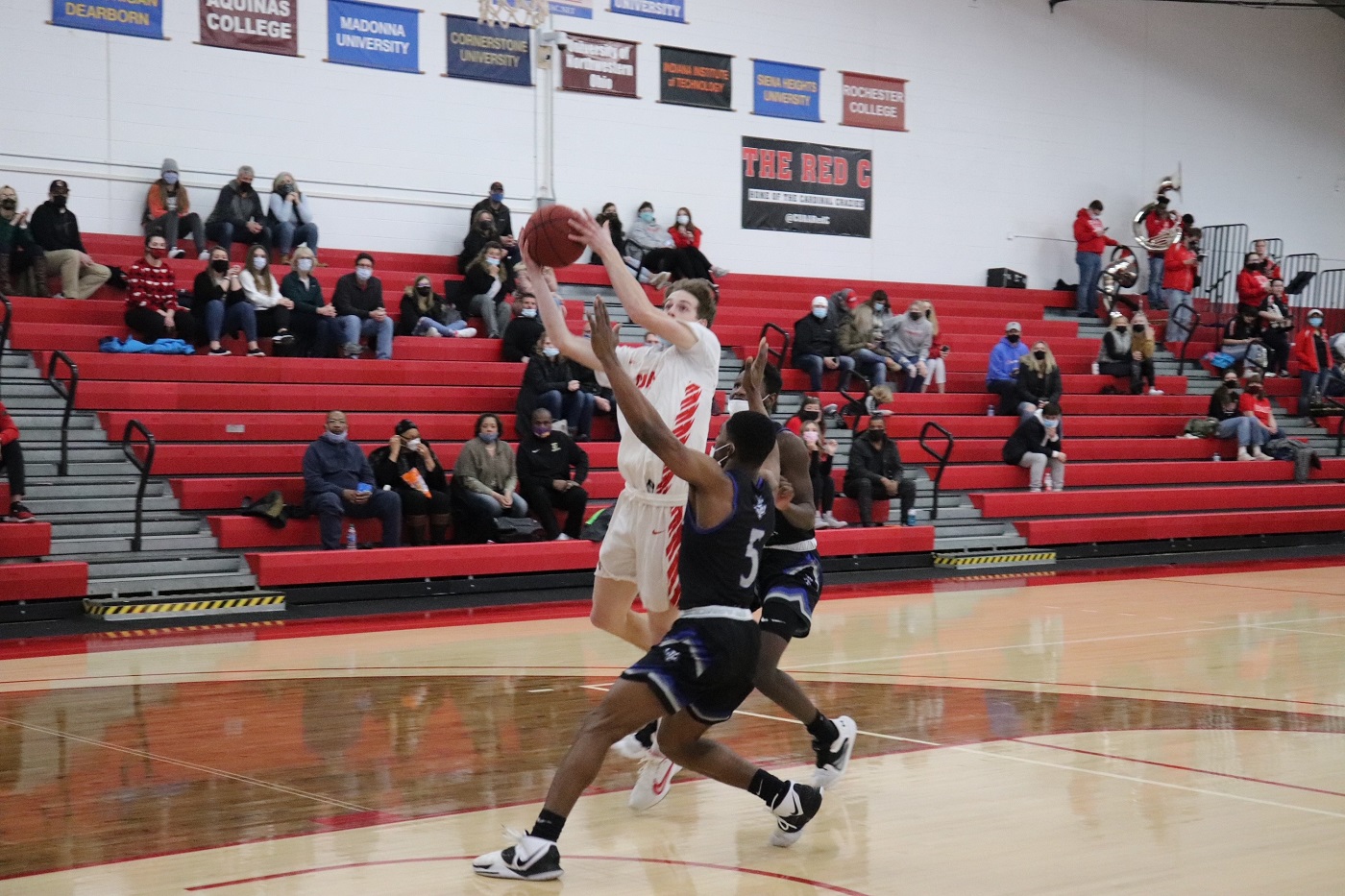 Matt Lockhart recorded team leading 8 rebounds vs. Aquinas