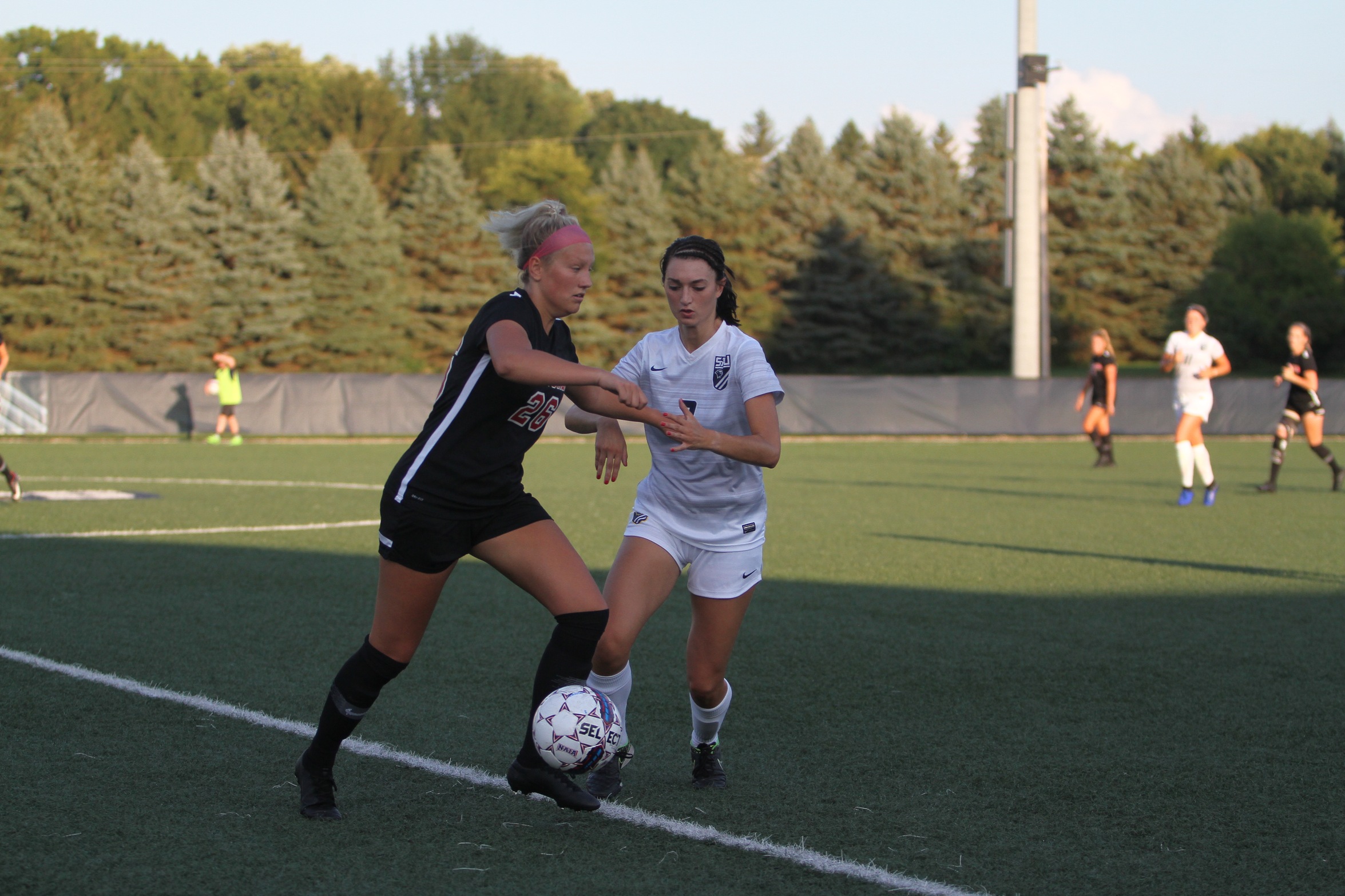 Cardinals Soar Past Cougars in Season Opener