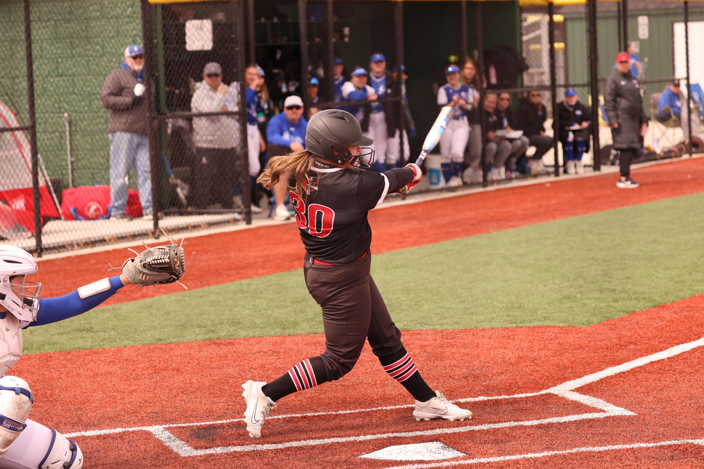 Softball drops doubleheader at #11 Madonna